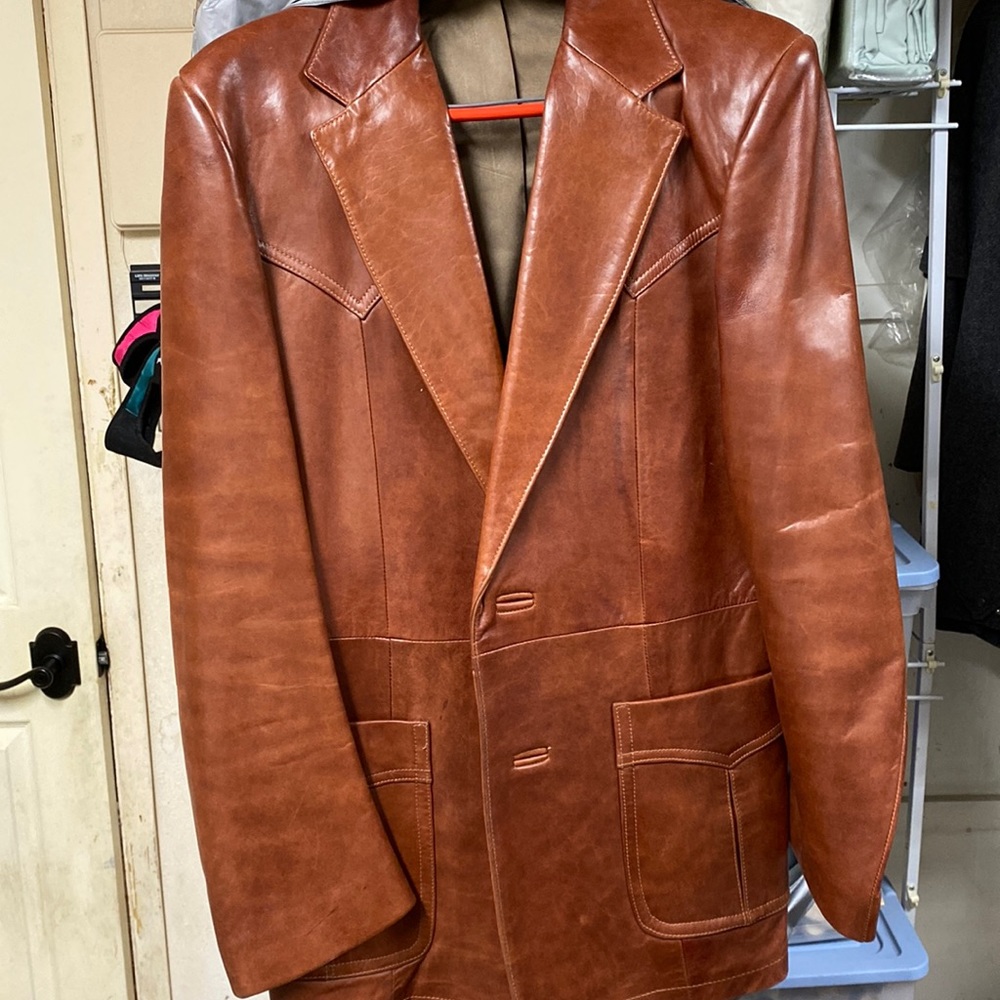 Genuine leather mens coat. Size 40 long.